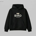 Cream ribbon bow graphic on a black heavyweight hoodie.320gsm hoodie featuring BIRD VECTOR minimalist text
